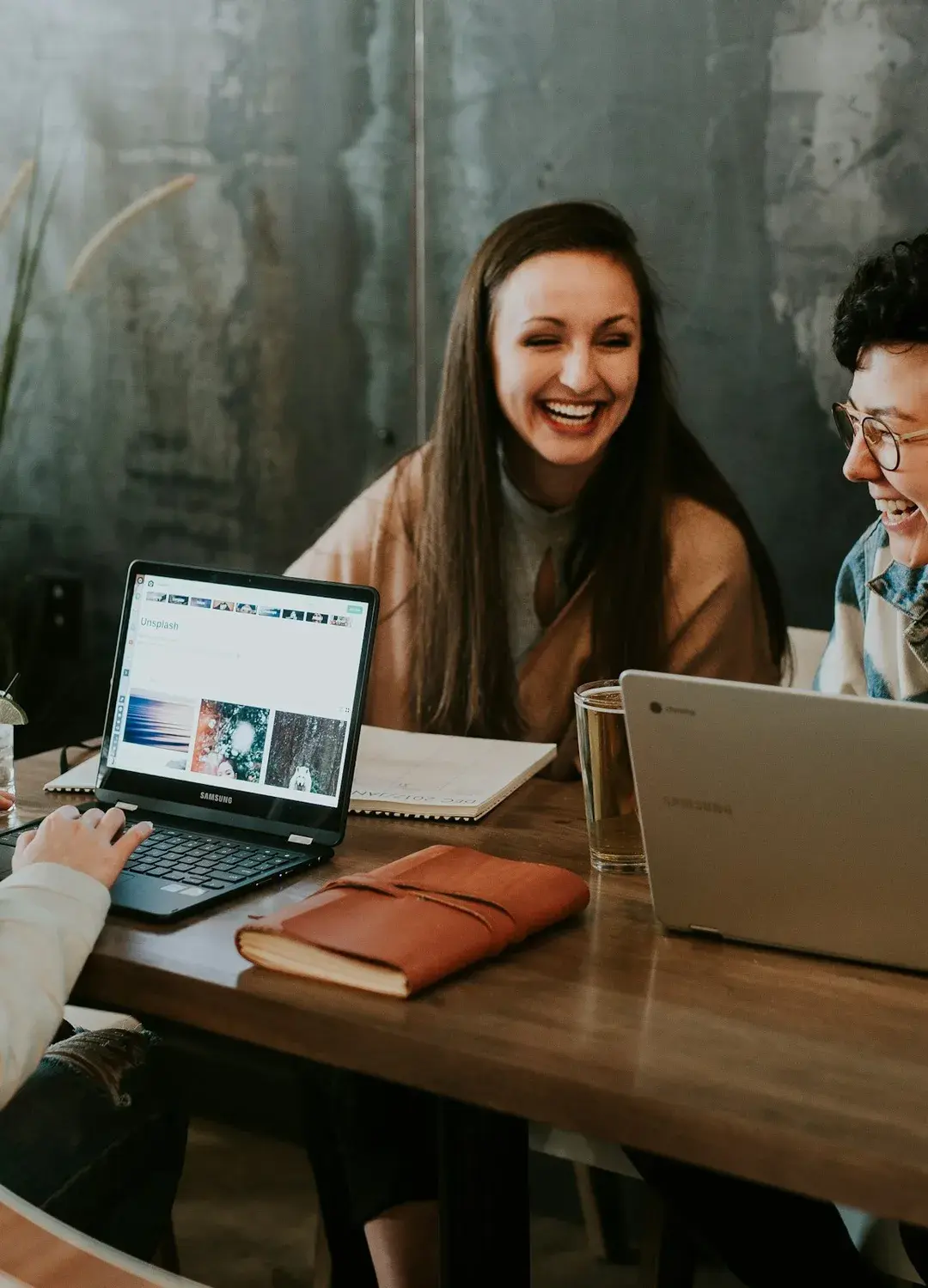 People working together on laptops